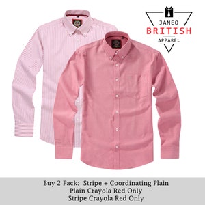 Könnte beinhalten: Zwei langärmelige Hemden, eines gestreift und eines einfarbig, beide in Rosatönen und Weiß. Die Hemden sind mit "Buy 2 Pack: Stripe + Coordinating Plain" und "Plain Crayola Red Only" und "Stripe Crayola Red Only" beschriftet.