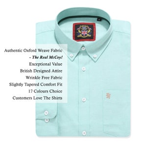 May include: A light green Oxford weave shirt with a button-down collar and a chest pocket. The shirt features a small embroidered design and a label with a crest and the Union Jack. Text on the shirt reads: Authentic Oxford Weave Fabric - The Real McCoy!