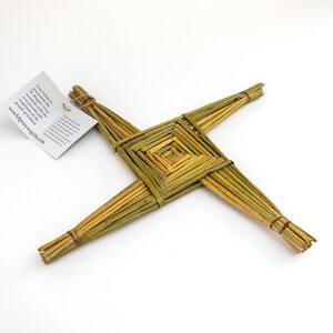 May include: A traditional Irish St. Brigid's cross made from woven straw. The cross is a symbol of faith and is often used in Irish folk traditions.