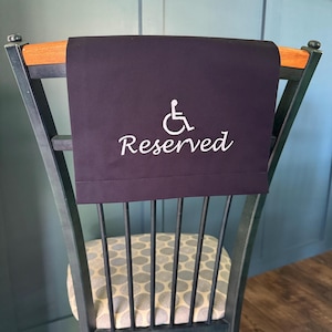 May include: A set of three ceramic mugs with a speckled, matte finish. Each mug features a different color: light blue, cream, and gray. The mugs have a simple, modern design and a comfortable handle.