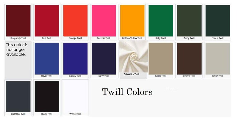 May include: A color chart displaying various twill fabric swatches. Colors include burgundy, red, orange, fuchsia, yellow, green, and navy. The text "Twill Colors" is below the swatches. One swatch is labeled "This color is no longer available."