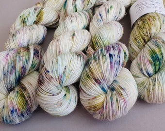 Hand dyed ‘Monet’s Garden’ speckled  superwash merino/alpaca/nylon fingering weight sock yarn