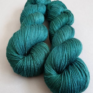 Hand dyed "Hummingbird" 50/50 non superwash merino/silk fingering weight yarn