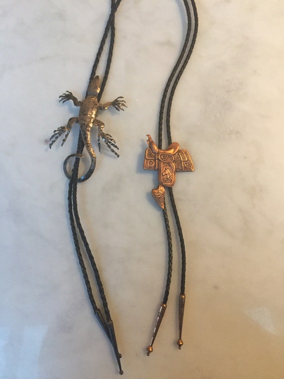 Pair of Bolo Ties, Alligator and Western Saddle