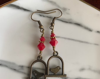 Bird in a window earring