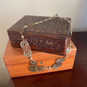 Gears of change necklace