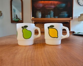 A Pair of 60s Vintage Fire King Coffee Mugs - Pear and Lemon - Milk Glass MCM Cup