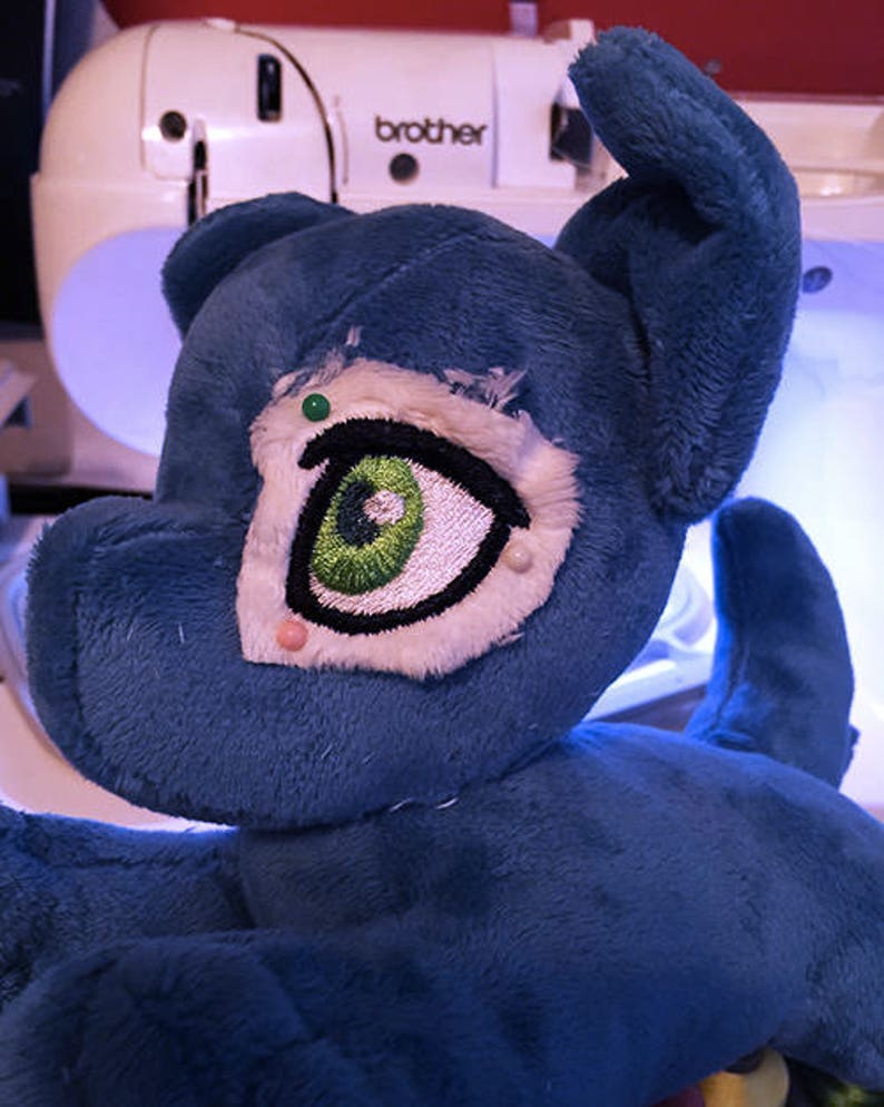 button eye plush