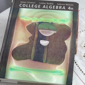 May include: A hardcover textbook titled College Algebra 4th edition by James Stewart, Lothar Redlin, and Saleem Watson. The cover features a dark brown top section with white text and a central abstract graphic with green, brown, and white tones.