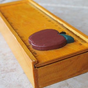 Vintage wooden pencil box with apple shaped sliding ruler lid - collectible home office, back to school supply