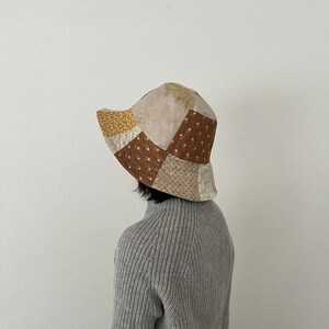 Brown and beige quilted patchwork bucket hat