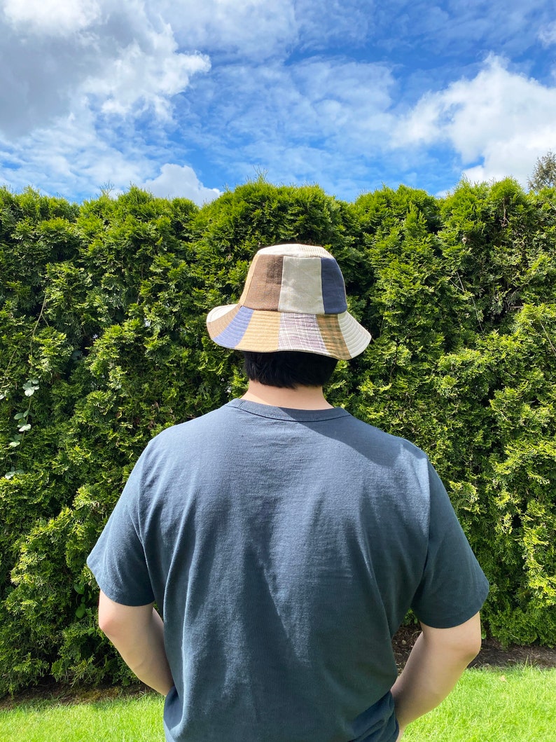 Brown beige taupe gold bucket hat