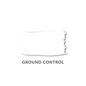 May include: White paint swatch with the text "GROUND CONTROL" below it.