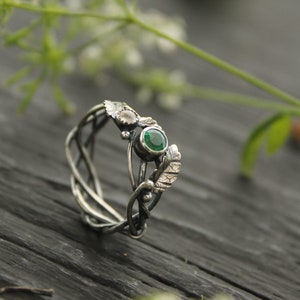 Engagement ring with natural emerald and moonstone Silversmithing