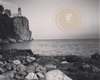Lighthouse, Water, nautical,   black and white, slight blue tint, film grain photograph