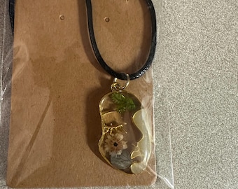 Abstract face pendant
