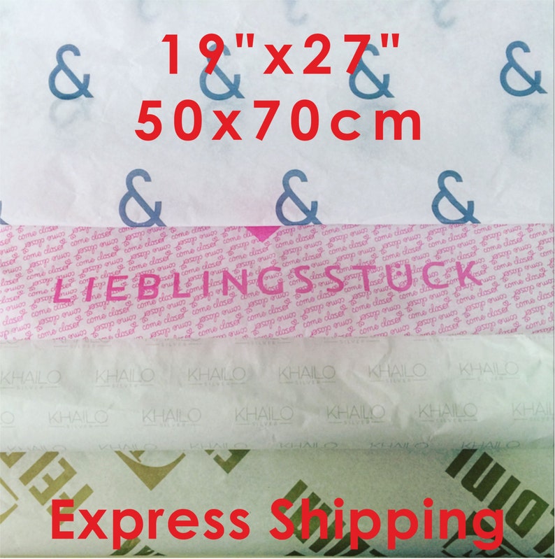 May include: Assorted tissue paper rolls with various patterns and text. The top layer features blue ampersands, and the dimensions are 19" x 27" (50 x 70cm). The middle layer has the word "LIEBLINGSSTUCK".