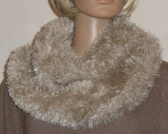 Möbius scarf made of very light brown fringe yarn