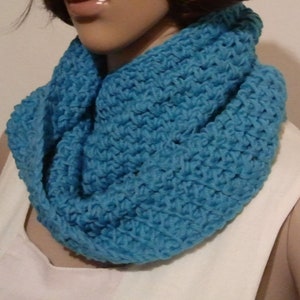 Tunisian crocheted Möbius scarf in a light blue image 1