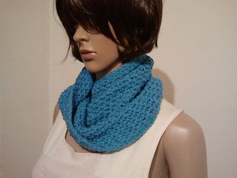 Tunisian crocheted Möbius scarf in a light blue image 1