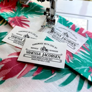 Flat custom fabric labels in a simple vintage style. Personalize with your name or business name. 2"W x 1.25"H, 30 per sheet. 100%  cotton