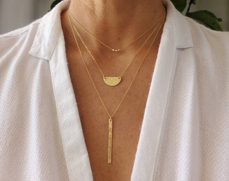 Gold half outlet necklace designs
