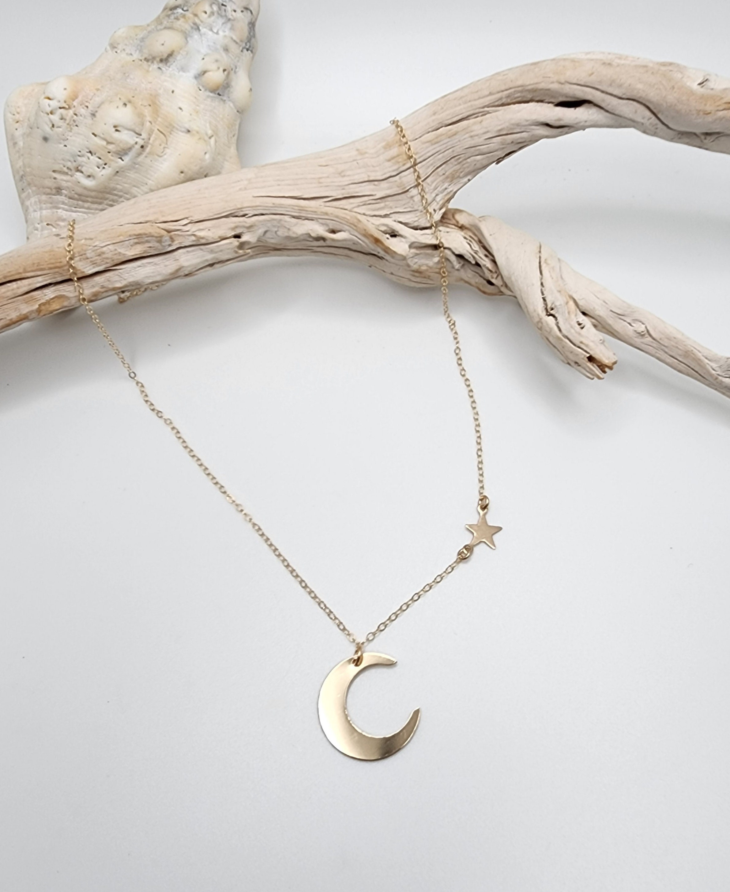 Bone moon and star on sale necklace