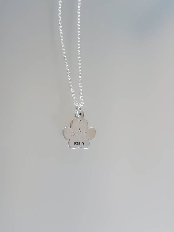 Tiny paw print on sale necklace