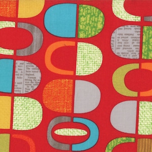 May include: Red fabric with a repeating pattern of colorful abstract shapes. The shapes are a combination of circles, ovals, and half circles. The colors are red, orange, yellow, green, blue, and gray.