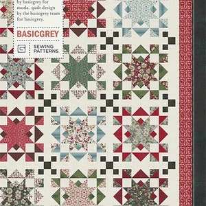 May include: A quilt pattern titled "Shiny & Bright" by Basicgrey. The design features star patterns in red, green, and blue floral prints on a cream background. The pattern includes the text "PAT065" and "BASICGREY".