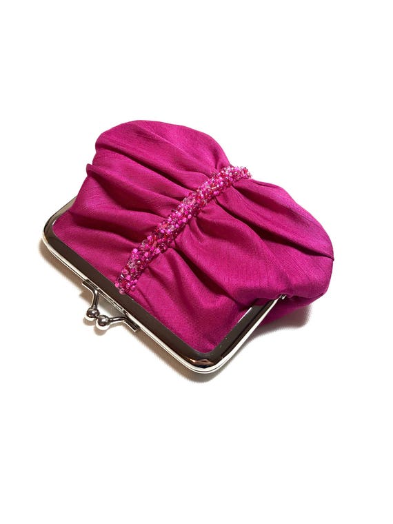 deep pink clutch bag