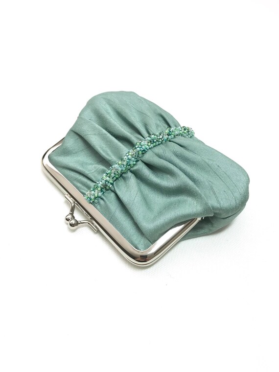 sage green clutch bag