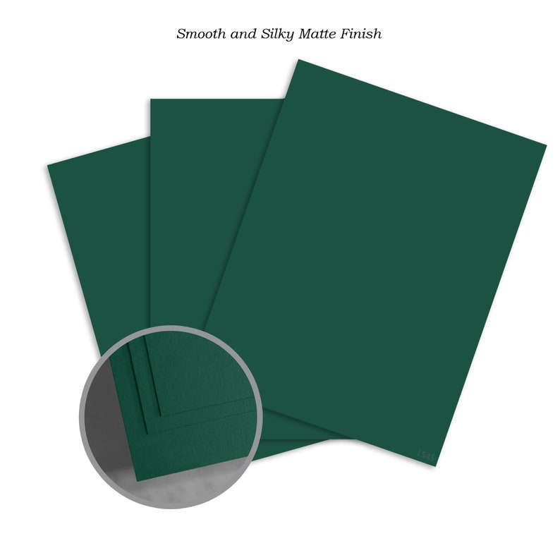 May include: Three sheets of dark green cardstock with a smooth, silky matte finish.  The cardstock is folded to show the texture.