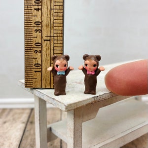 Dollhouse Miniature Baby doll Toy for playroom, nursery or toy shop.