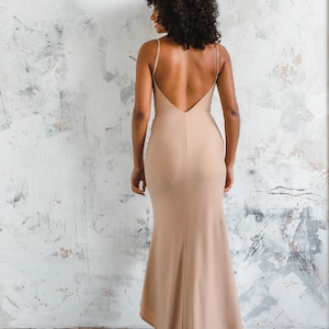 fitted nude stretch slip dress with low back and thin straps
