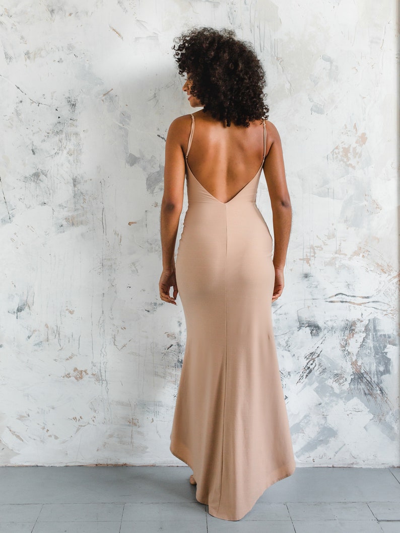 fitted nude stretch slip dress with low back and thin straps