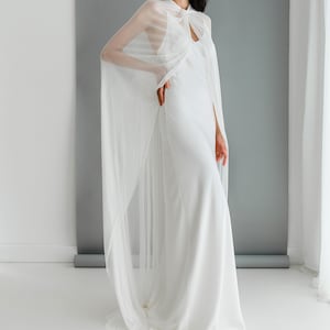 Minimalist Bridal Cape Featuring a Contemporary Twist Neck in a Sheer ...