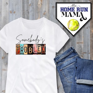 May include: White t-shirt with the text "Somebody's Problem" in black script. The word "Problem" is made up of colourful license plates.