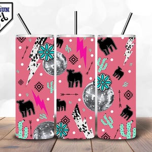 May include: Three pink stainless steel tumblers with a cow, cactus, lightning bolt, and disco ball pattern. The tumblers are all the same design.