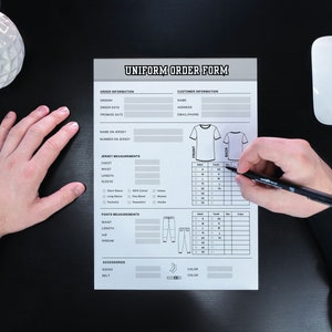 May include: A black and white uniform order form with sections for order information, customer information, jersey measurements, pants measurements, and accessories. The form includes a diagram of a t-shirt and pants with size charts.