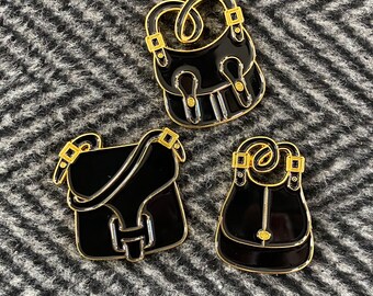 Black Trio Enamel pin set featuring Vintage Coach Crescent, Courier & Pony Express bags