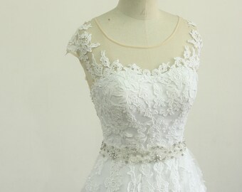 Keyhole back white A line lace wedding dress with elegant beading sash