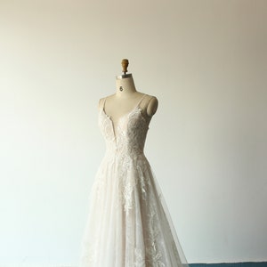 Deep V Neckline A-Line Tulle Lace Wedding Dress: Blush Lining