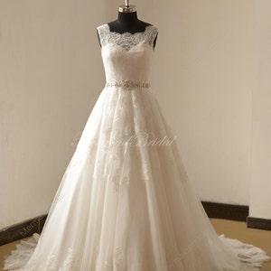 Open back Ivory a line lace wedding dress with illusion neckline and beads sash