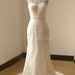 Open back Fit and flare Vintage lace Wedding dress with capsleeves and removable bow 