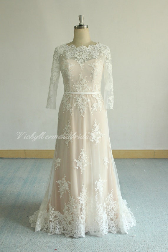 blush fit and flare wedding dress