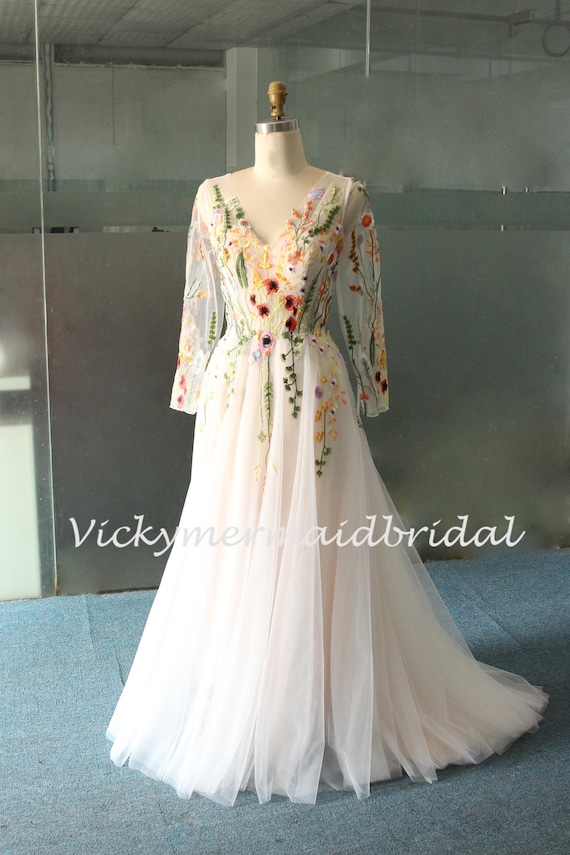 Wildflower Lace Wedding Dress: Romantic Open Back, Long Sleeves Wildflower Lace Wedding Dress: Romantic Open Back, Long Sleeves