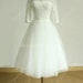 Vintage tea length ivory tulle lace wedding dress with mid sleeves 