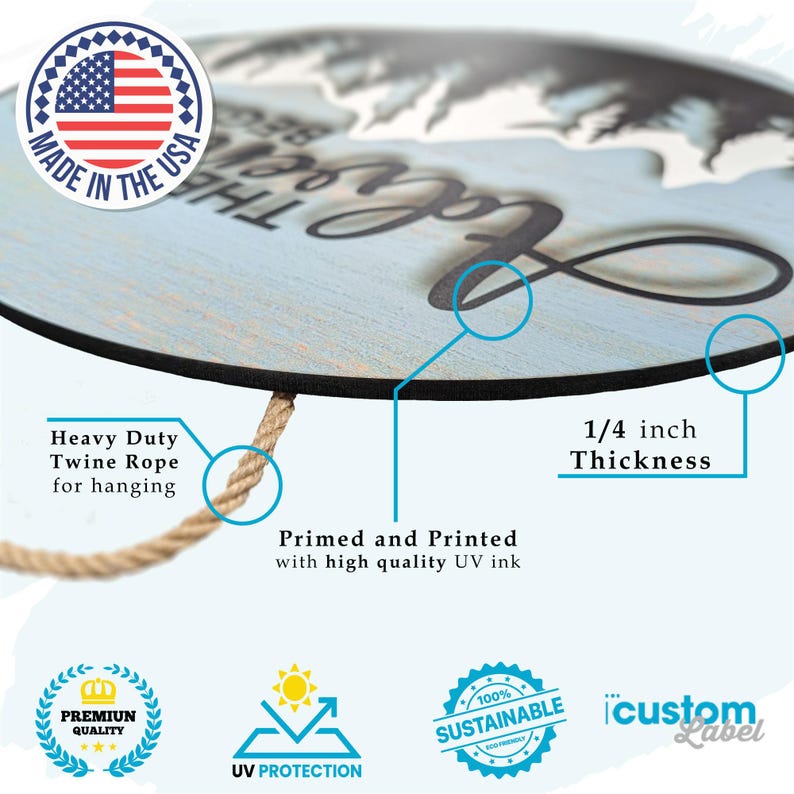 May include: A round wooden sign with a blue background and white text that reads "Love the Mountains". The sign is 1/4 inch thick and has a twine rope for hanging. It is made in the USA and features a UV-protected, sustainable design.
