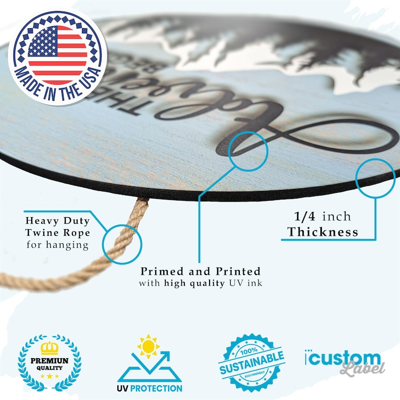 May include: A round wooden sign with a blue background and white text that reads "Love the Mountains". The sign is 1/4 inch thick and has a twine rope for hanging. It is made in the USA and features a UV-protected, sustainable design.